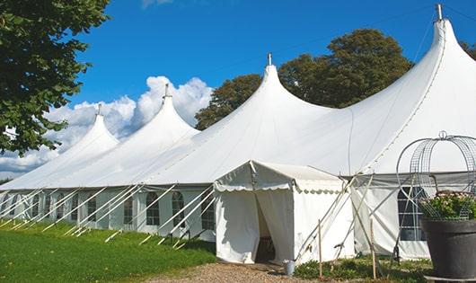 high-quality portable toilets stationed at a wedding, meeting the needs of guests throughout the outdoor reception in Winter Park